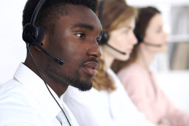 istock African american call operator in headset. Call center business or customer service concept 842130432