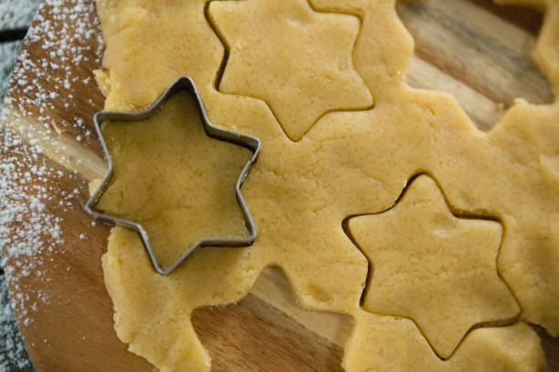 istock Overhead view of star shape cutter on dough 842130480