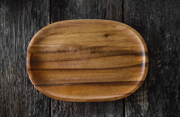 istock wood plate on wooden 842133310