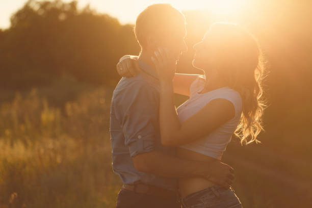 istock Couple in love at sunset 842135084