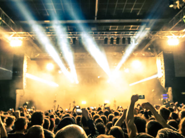 istock Concert crowd filming with smart phones 842144256