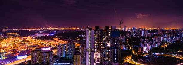 istock panorama night cityscape on twilight time and industry area 842144554