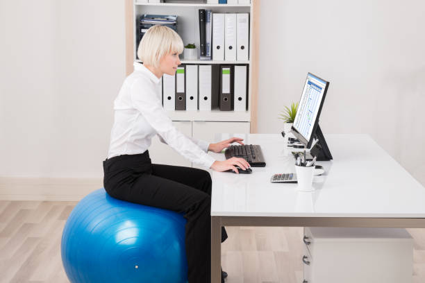 istock Businesswoman Looking At Gantt Chart On Computer 842145220