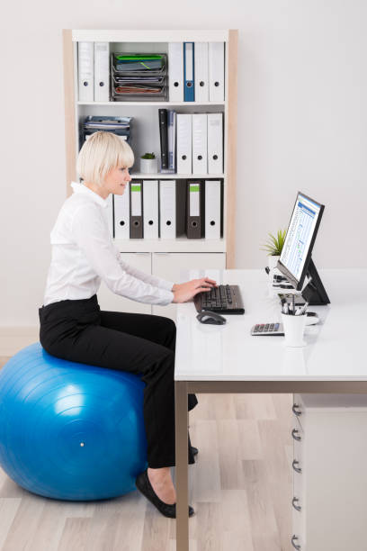 istock Businesswoman Looking At Gantt Chart On Computer 842145286
