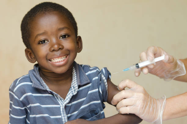 African boy happy about getting a vaccination