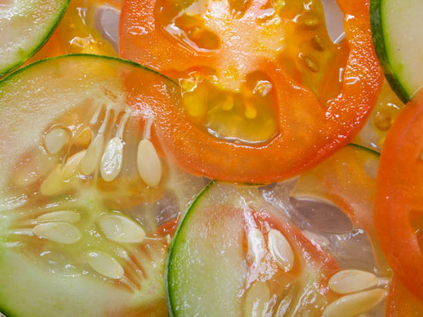 istock Close up tomato and cucumber slid 842153060