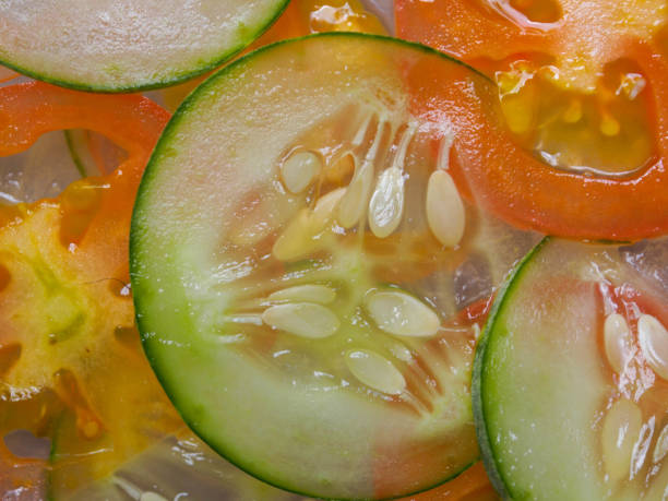 istock Close up tomato and cucumber slid 842153062