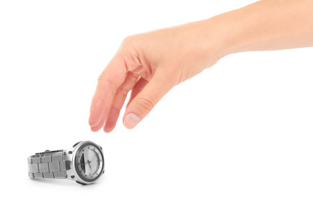 istock female hand holding hand watches. Isolated on white background 842153194