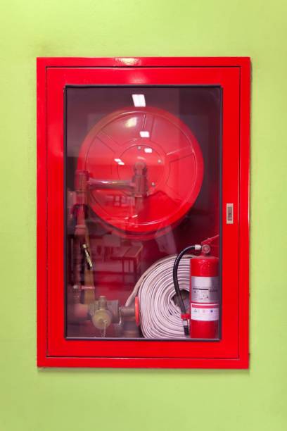 istock Fire extinguisher and fire hose reel in hotel corridor 842155972