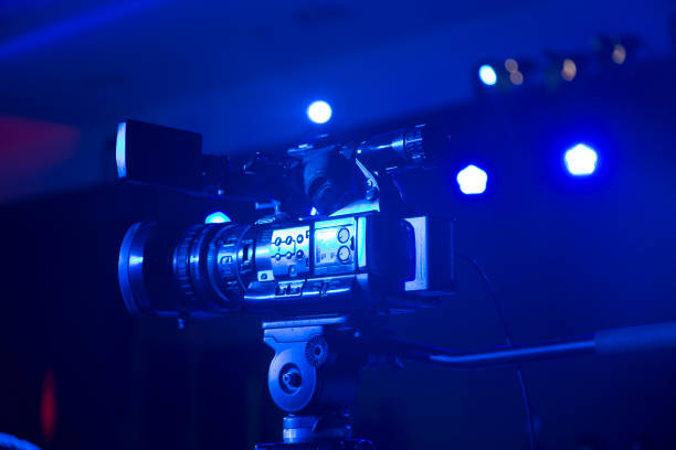 istock Closeup of television camera in studio under blue light. 842162874