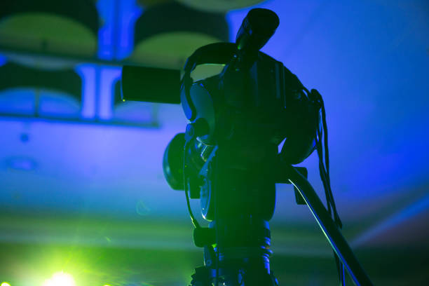 istock Camera and headphone with blue light at the Concert. 842164150