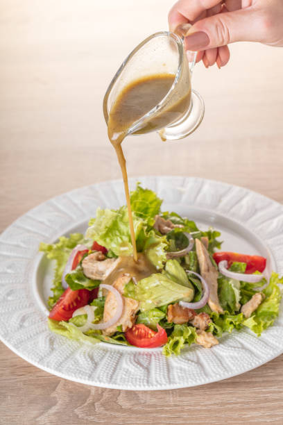 istock salad with fresh vegetables and chicken 842170972