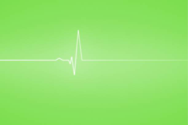 istock Medical background with green ecg line 842173874