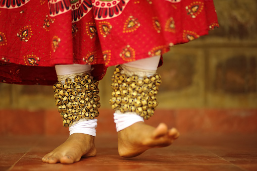 Macro photo of foot movement of a female kathak dancer.