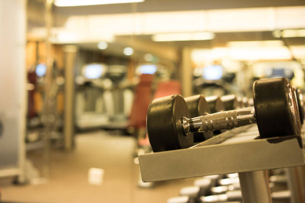 istock Fitness club weight training equipment 842177846