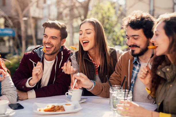 istock Friends eating at a restaurant 842181400
