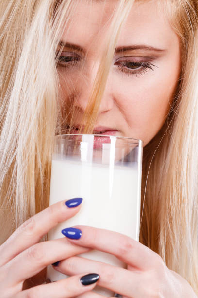 istock Woman drinking milk from glass 842183622