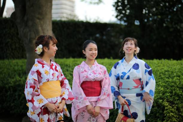 istock Japanese young women in Yukata talking 842184260