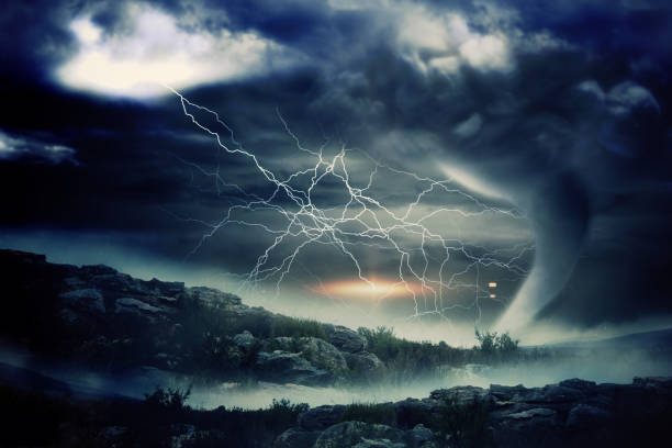 istock Stormy sky with tornado over landscape 842187580