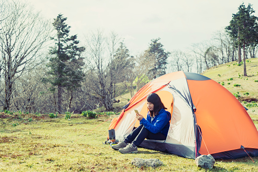 Woman is enjoying Camping in nature