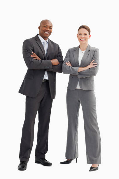 istock Smiling business man and woman posing 842196008