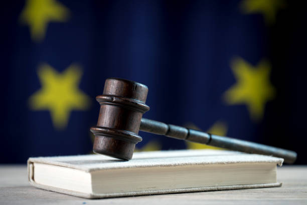 istock Law and Justice symbols. EU flag background. 842196654