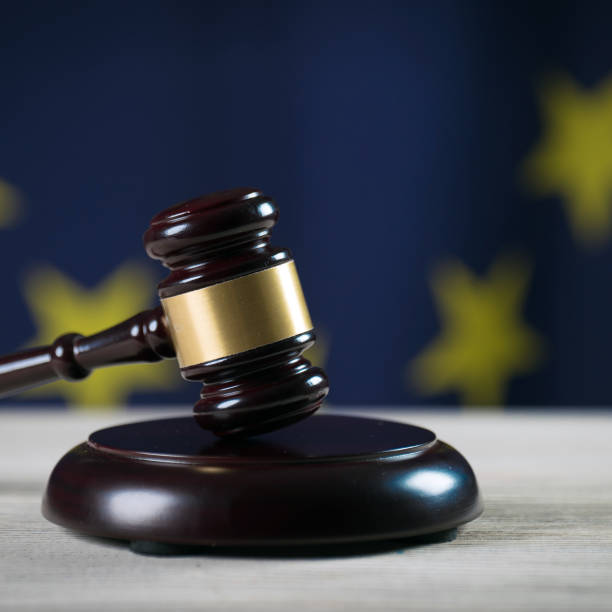 istock Law and Justice symbols. EU flag background. 842196658