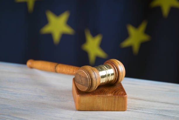 istock Law and Justice symbols. EU flag background. 842196684