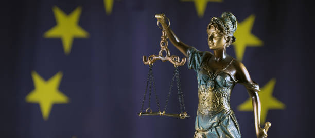 istock Law and Justice symbols. EU flag background. 842196720