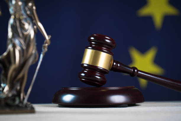 istock Law and Justice symbols. EU flag background. 842196760
