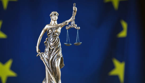istock Law and Justice symbols. EU flag background. 842196786