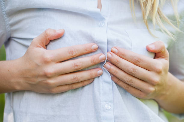istock Woman holding her boobs 842196866