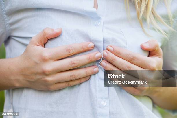 Woman Holding Her Boobs Stock Photo - Download Image Now - Breast, Pregnant, Picking Up