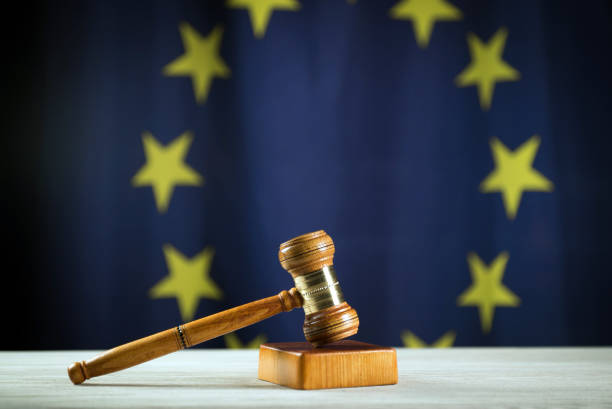 istock Law and Justice symbols. EU flag background. 842199410