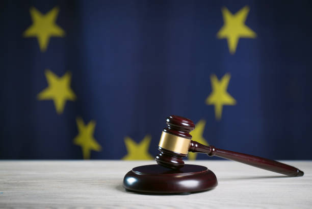 istock Law and Justice symbols. EU flag background. 842199438