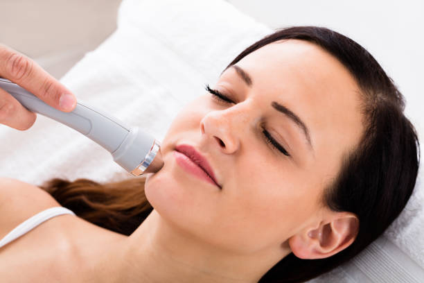 istock Woman Receiving Face Massage From Therapist 842201940