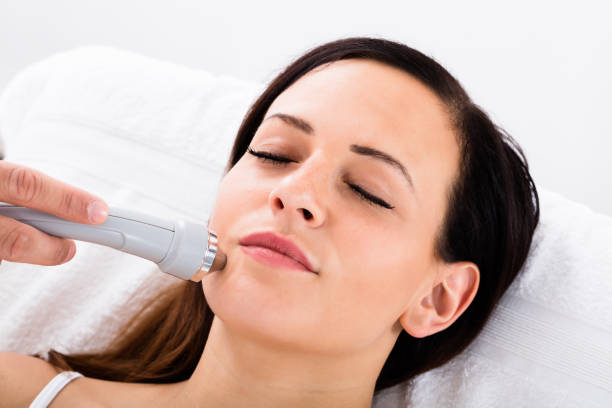 istock Woman Receiving Face Massage From Therapist 842201944