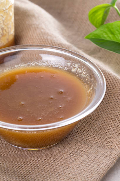 istock Honey in a glass bowl. 842202148