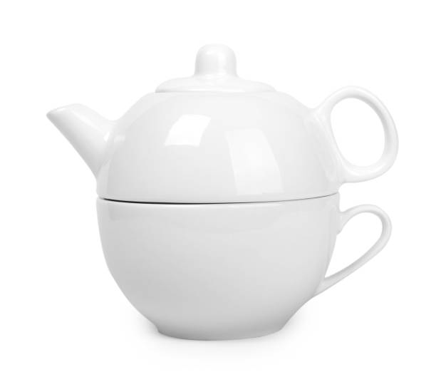 istock white ceramic kettle or teapot with cup. Isolated on white background 842202172