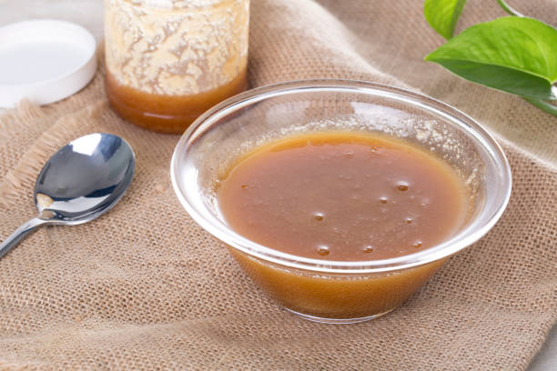 istock Honey in a glass bowl. 842202188