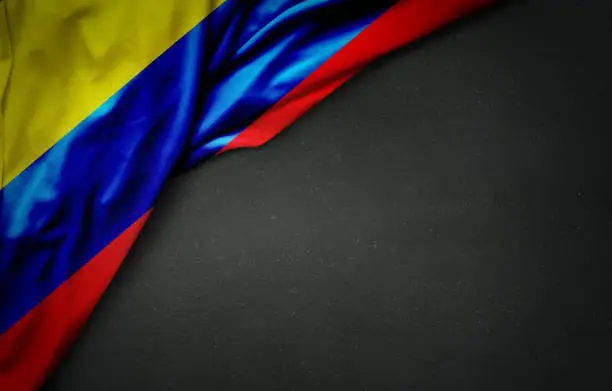 Photo of flag of Colombia on blackboard