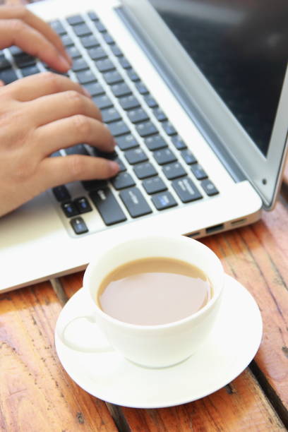 istock Male hand typing with laptop 842206796