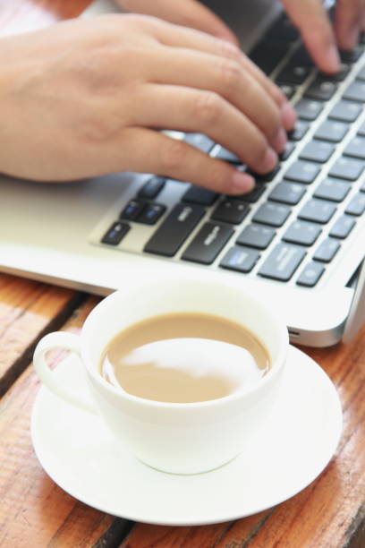 istock Male hand typing with laptop 842206848