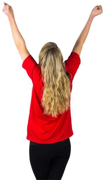istock Cheering football fan in red 842209236
