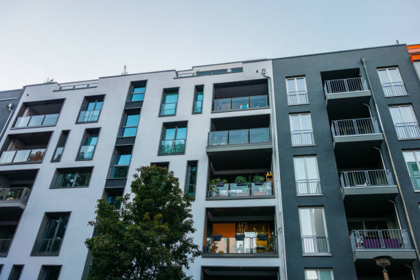 istock white and grey facaded apartment house 842209608