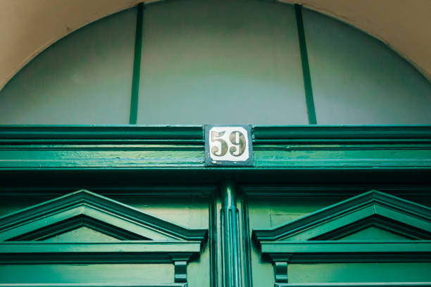 istock number 59 on a green door 842210228