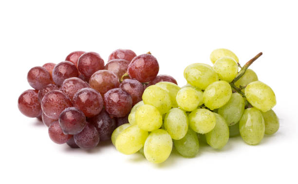 istock A bunch of green and red grapes isolated on a white. 842216562