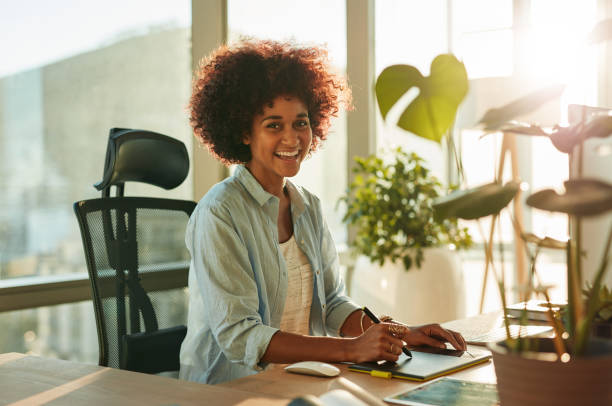 istock Afro american woman at her creative workplace 842216590