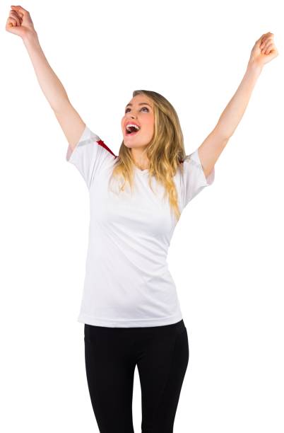 istock Pretty football fan in white cheering 842217154