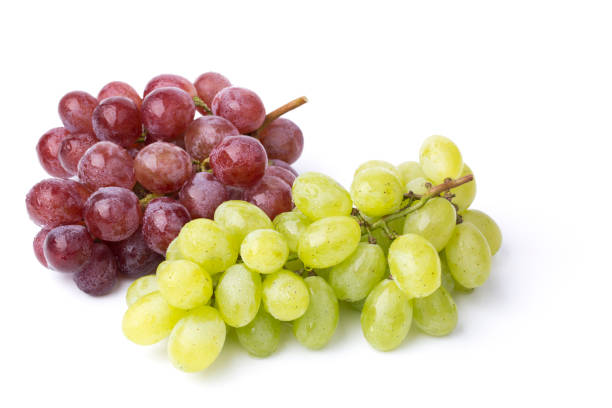 istock A bunch of green and red grapes isolated on a white. 842217348